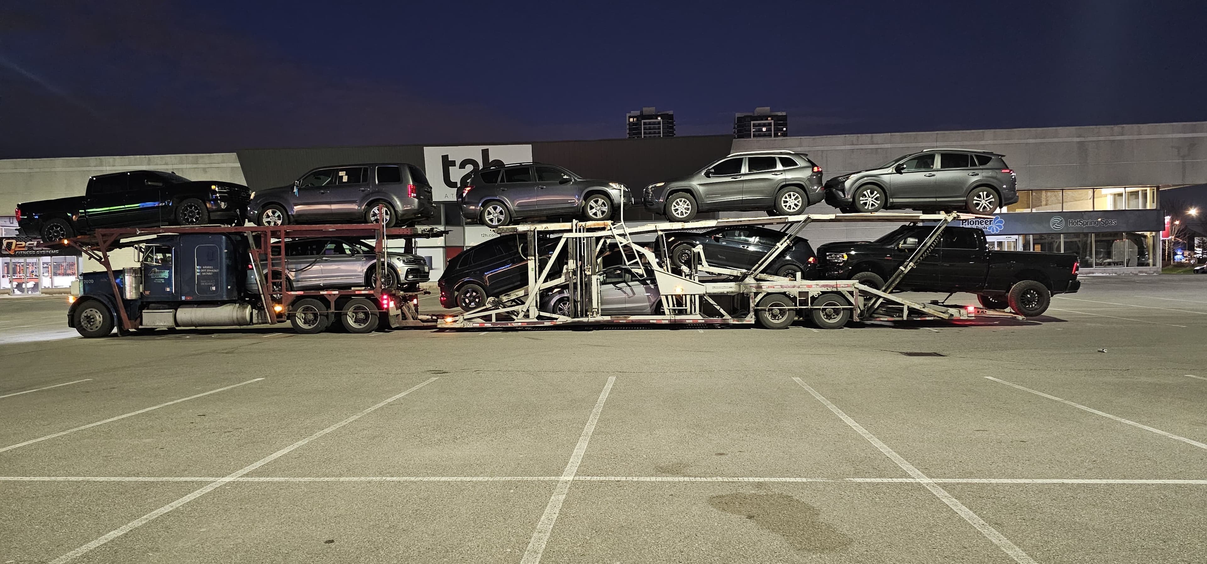 Prairie Auto Transport carrier loaded with vehicles for shipping from Toronto to Vancouver across Canada